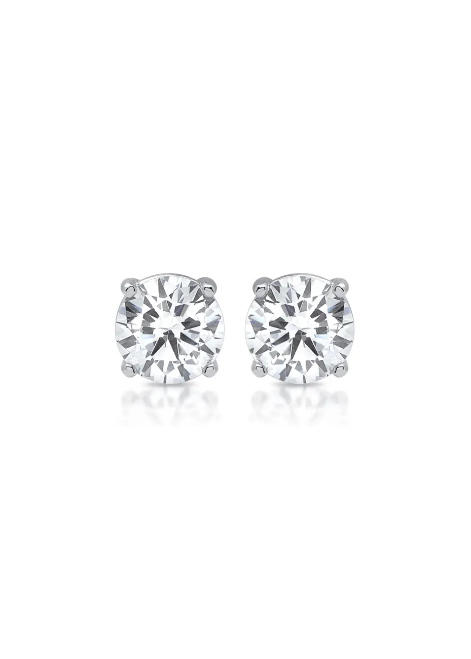 Pendientes dormilonas oro blanco con diamantes 0,64ct