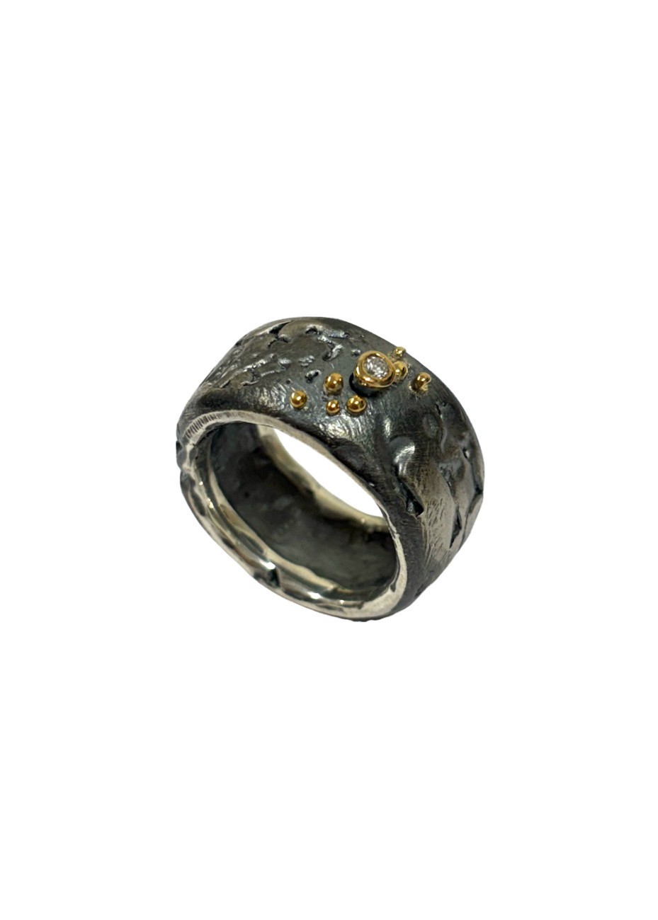 Anillo plata oxidada, oro amarillo y diamante rosado