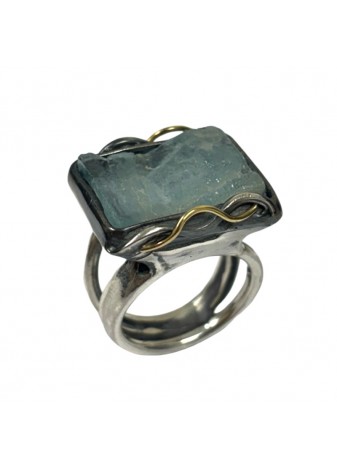 Anillo aguamarina en bruto en plata y oro