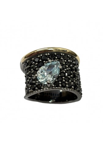Anillo PUA plata oxidada, oro, topacio y espinelas negras